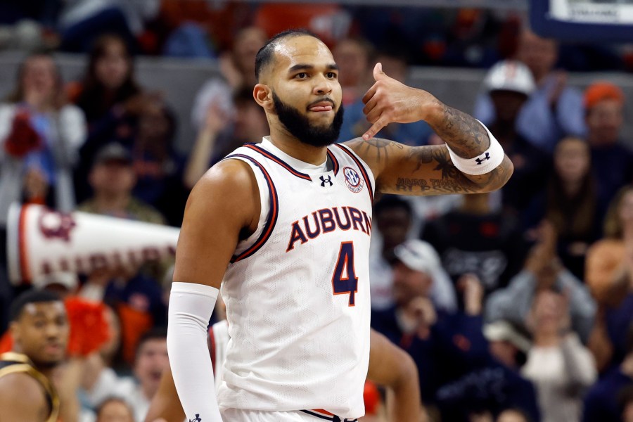 Auburn forward Johni Broome reacts after making a 3-point basket against Missouri during the first half of an NCAA college basketball game, Saturday, Jan. 4, 2025, in Auburn, Ala. (AP Photo/Butch Dill)