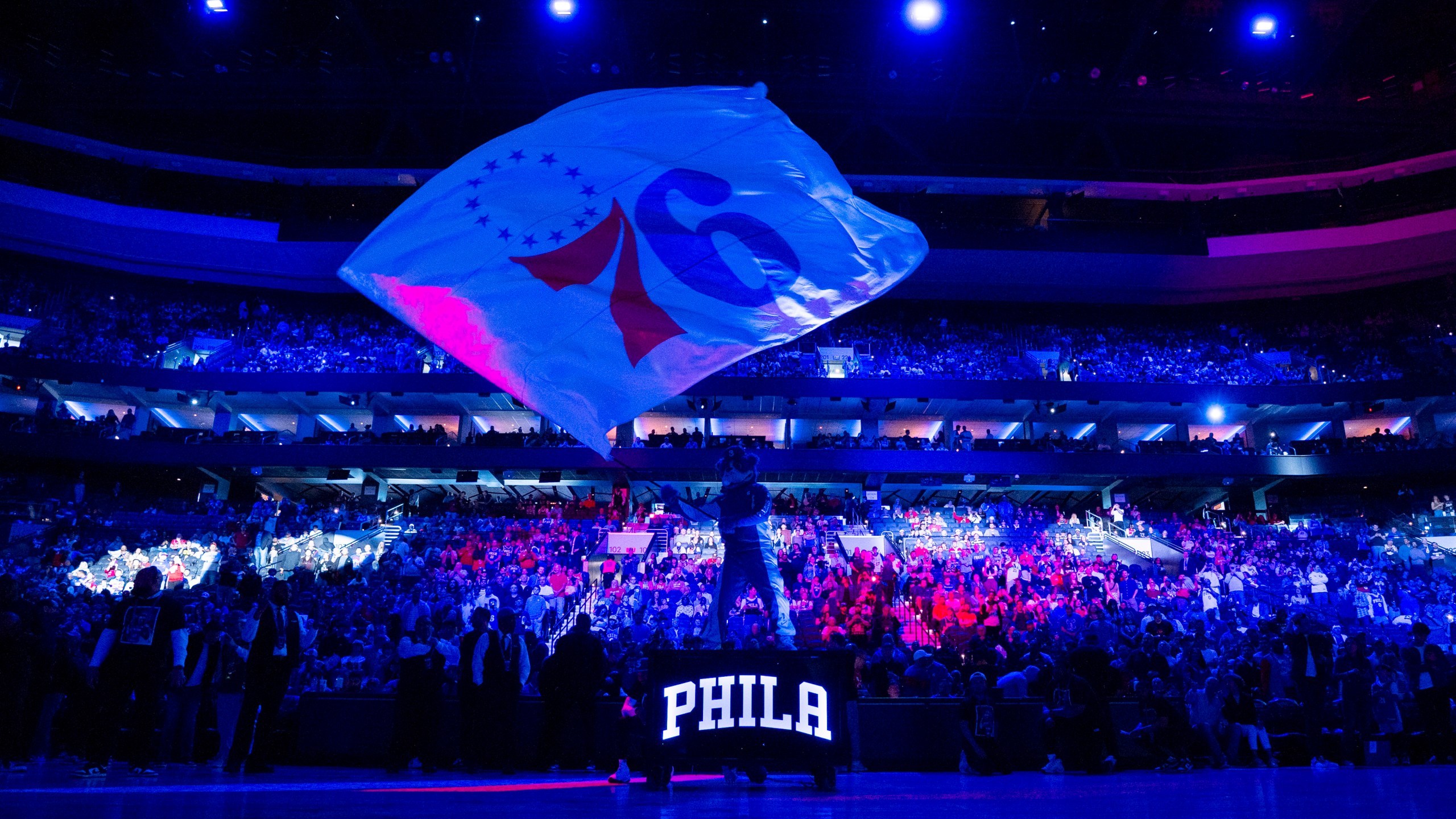 FILE - Philadelphia 76ers mascot Franklin waves the flag during pre-game introductions prior to the NBA basketball game against the Brooklyn Nets, April 14, 2024, in Philadelphia. (AP Photo/Chris Szagola, file)