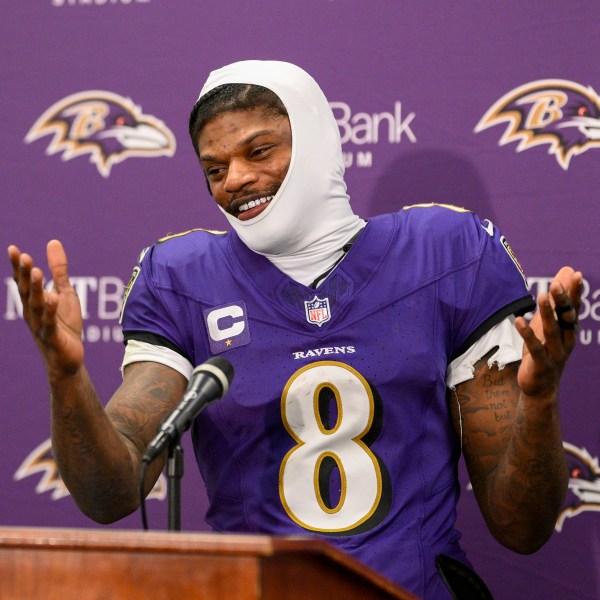 Baltimore Ravens quarterback Lamar Jackson talks to reporters following an NFL wild-card playoff football game against the Pittsburgh Steelers, Saturday, Jan. 11, 2025, in Baltimore. The Ravens won 28-14. (AP Photo/Nick Wass)