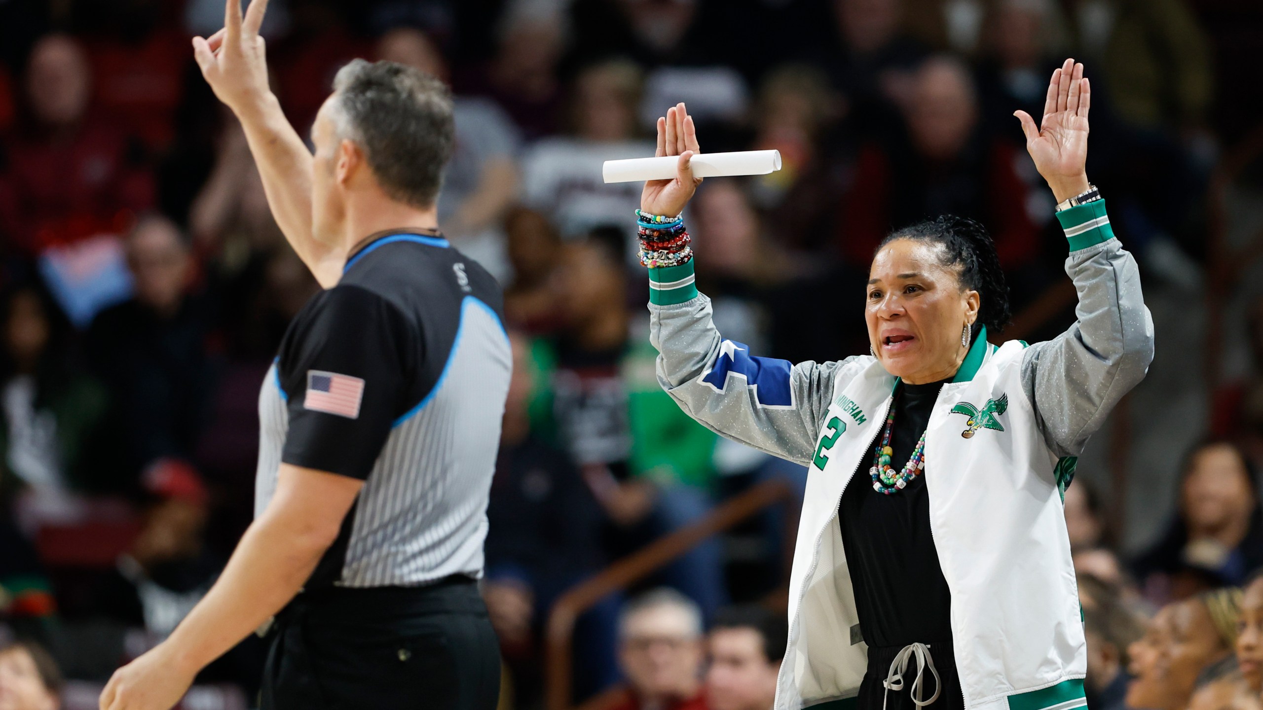 South Carolina head coach Dawn Staley argues with an official during the first half of an NCAA college basketball game against Texas in Columbia, S.C., Sunday, Jan. 12, 2025. (AP Photo/Nell Redmond)