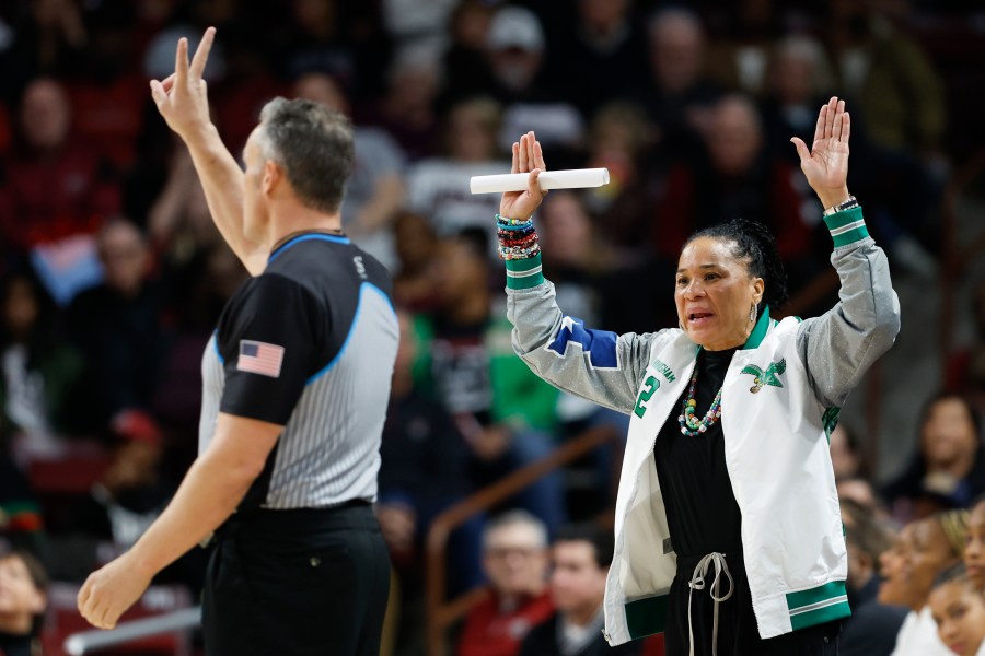 South Carolina head coach Dawn Staley argues with an official during the first half of an NCAA college basketball game against Texas in Columbia, S.C., Sunday, Jan. 12, 2025. (AP Photo/Nell Redmond)