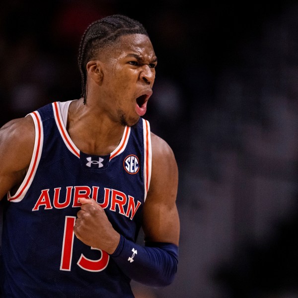 Auburn guard Miles Kelly (13) celebrates during the second half of an NCAA college basketball game against the South Carolina, Saturday, Jan. 11, 2025, in Columbia, S.C. (AP Photo/Scott Kinser)