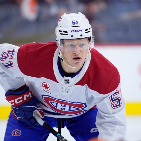 FILE - Montreal Canadiens' Emil Heineman gets set during a face off in an NHL hockey game against the Philadelphia Flyers, Sunday, Oct. 27, 2024, in Philadelphia. (AP Photo/Matt Slocum, File)