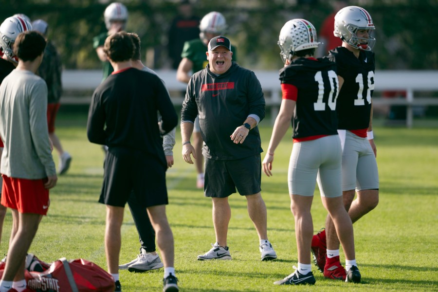 FILE - Ohio State offensive coordinator Chip Kelly laughs during practice in Carson, Calif., Monday, Dec. 30, 2024, ahead of Rose Bowl College Football Playoff game against Oregon. (AP Photo/Kyusung Gong, File)