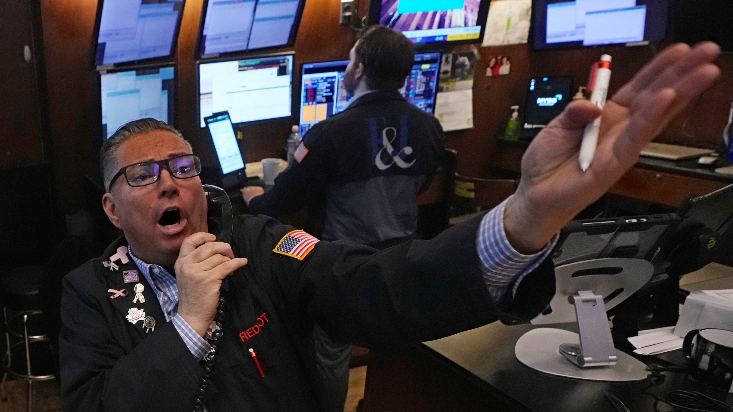 Trader Jonathan Mueller works on the floor of the New York Stock Exchange, Monday, Jan. 13, 2025. (AP Photo/Richard Drew)