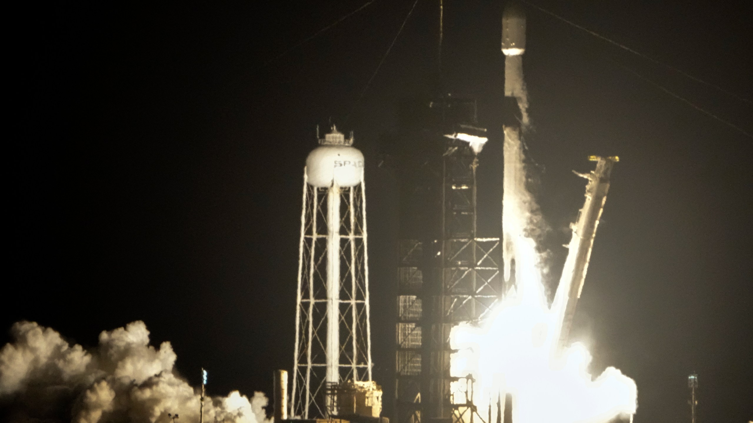 A SpaceX Falcon 9 rocket lifts off from pad 39A with a payload of a pair of lunar landers at the Kennedy Space Center in Cape Canaveral, Fla., Wednesday, Jan. 15, 2025. (AP Photo/John Raoux)