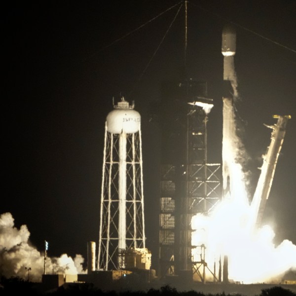 A SpaceX Falcon 9 rocket lifts off from pad 39A with a payload of a pair of lunar landers at the Kennedy Space Center in Cape Canaveral, Fla., Wednesday, Jan. 15, 2025. (AP Photo/John Raoux)