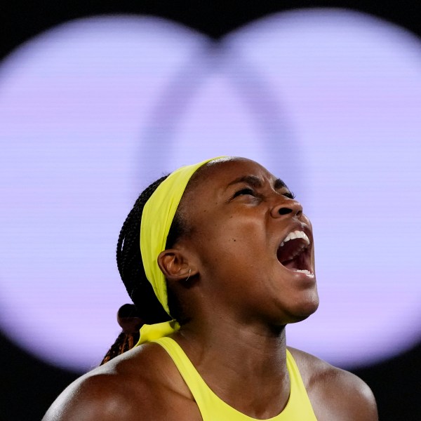 Coco Gauff of the U.S. reacts after winning a point against Jodie Burrage of Britain during their second round match at the Australian Open tennis championship in Melbourne, Australia, Wednesday, Jan. 15, 2025. (AP Photo/Vincent Thian)