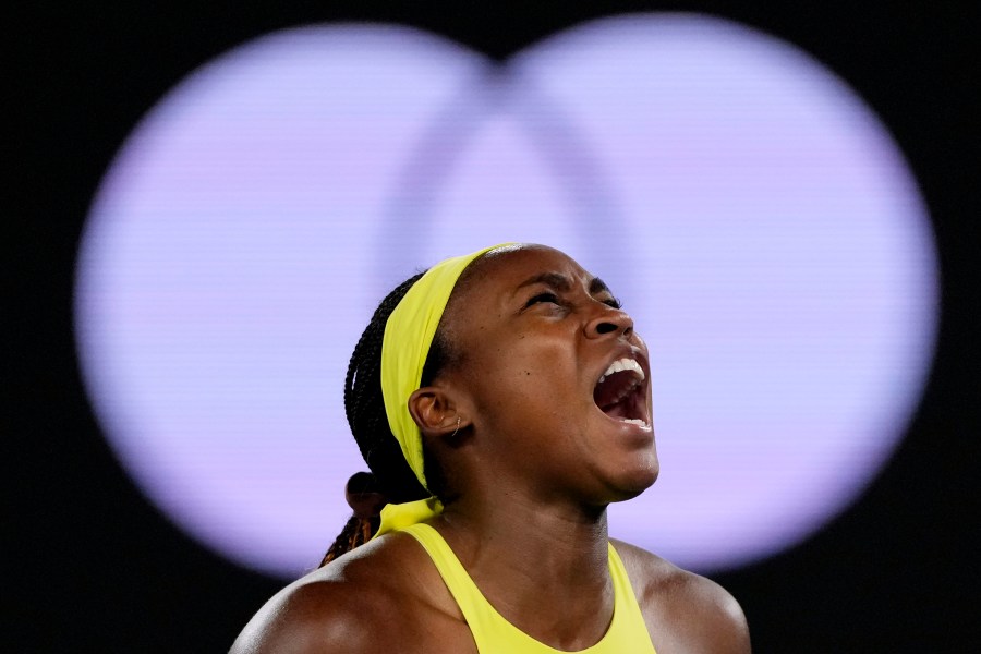 Coco Gauff of the U.S. reacts after winning a point against Jodie Burrage of Britain during their second round match at the Australian Open tennis championship in Melbourne, Australia, Wednesday, Jan. 15, 2025. (AP Photo/Vincent Thian)