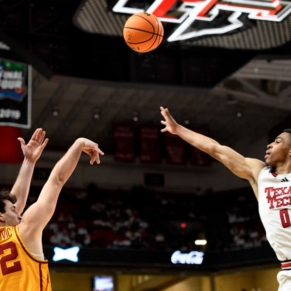 Iowa State's forward Milan Momcilovic (22) shoots the ball during the second half of an NCAA basketball game against Texas Tech, Saturday, Jan. 11, 2025, in Lubbock, Texas. (AP Photo/Annie Rice)