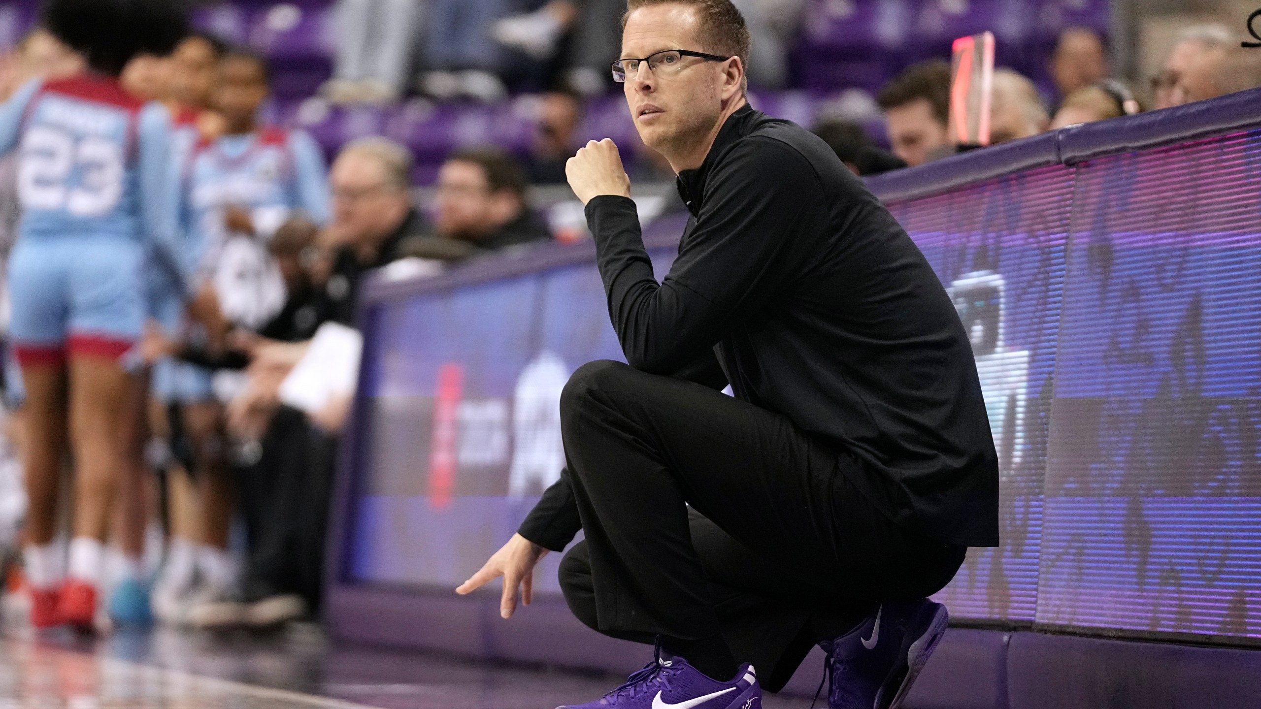 FILE - TCU head coach Mark Campbell watches play against Louisiana Tech in the second half of an NCAA college basketball game in Fort Worth, Texas, Sunday, Dec. 15, 2024. (AP Photo/Tony Gutierrez, File)