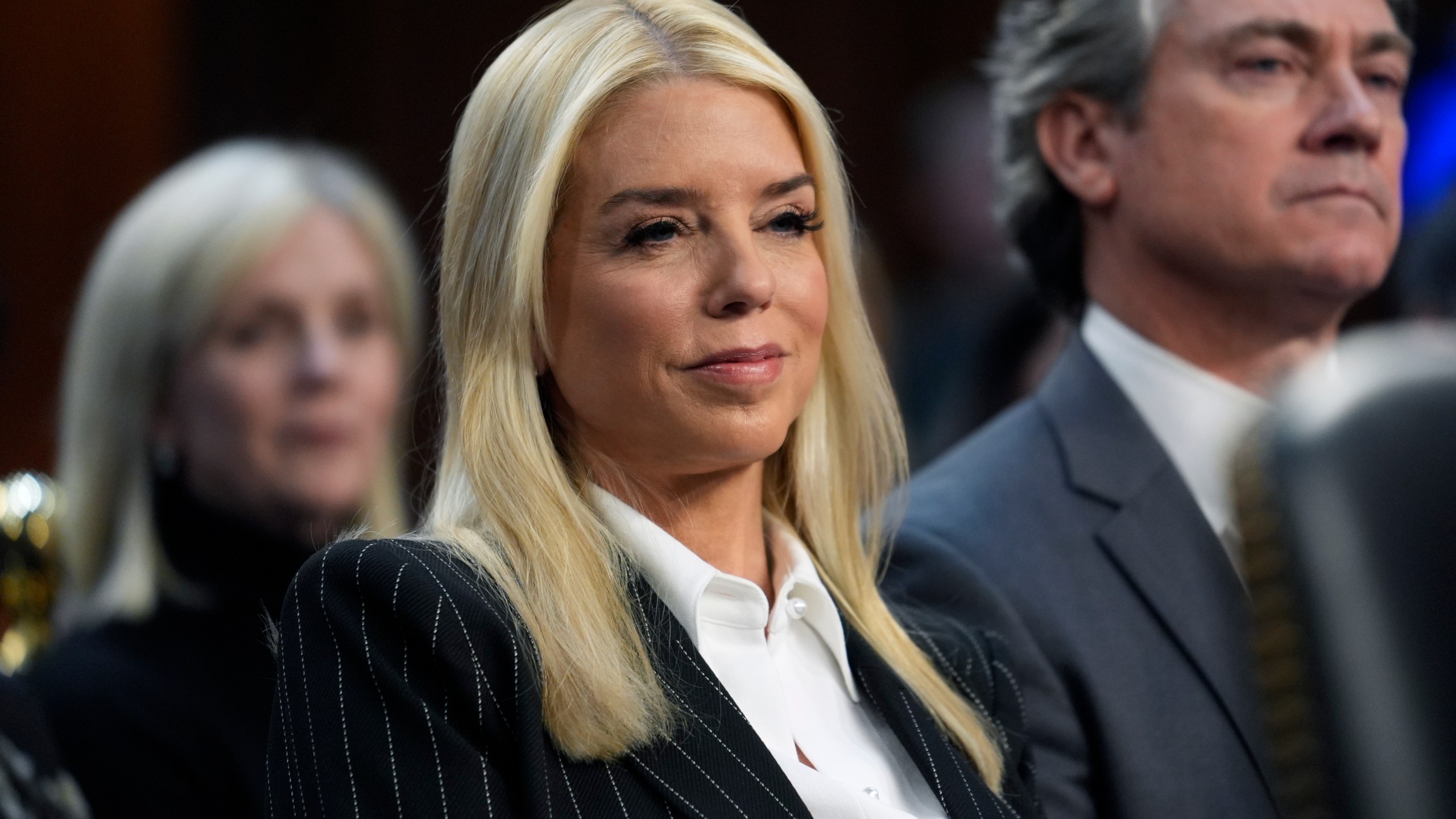 Pam Bondi, President-elect Donald Trump's choice to lead the Justice Department as attorney general, appears before the Senate Judiciary Committee for her confirmation hearing, at the Capitol in Washington, Wednesday, Jan. 15, 2025. (AP Photo/J. Scott Applewhite)