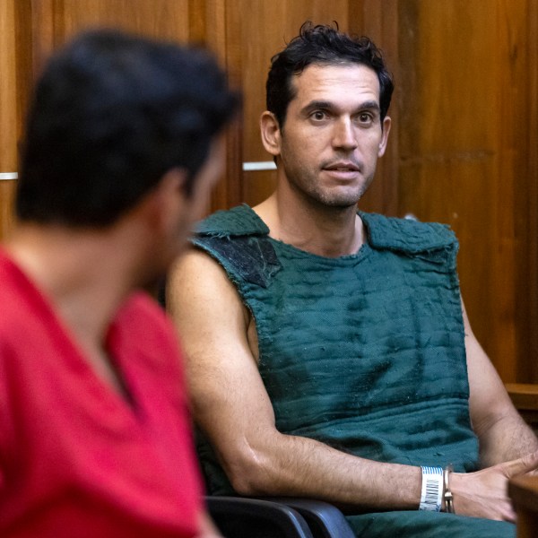 FILE - Alon Alexander, 37, right, and his twin brother, Oren, left, attend their bond hearing at the Richard E. Gerstein Justice Building after being charged with multiple state and federal crimes, including sex trafficking and rape, on Friday, Dec. 13, 2024, in Miami. (Matias J. Ocner/Miami Herald via AP, Pool)