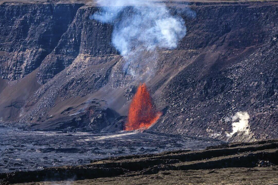 In this photo provided by Janice Wei, lava fountains from an eruption of Kilauea volcano on Wednesday, Jan., 15, 2025, in Hawaii. (Janice Wei/NPS via AP)