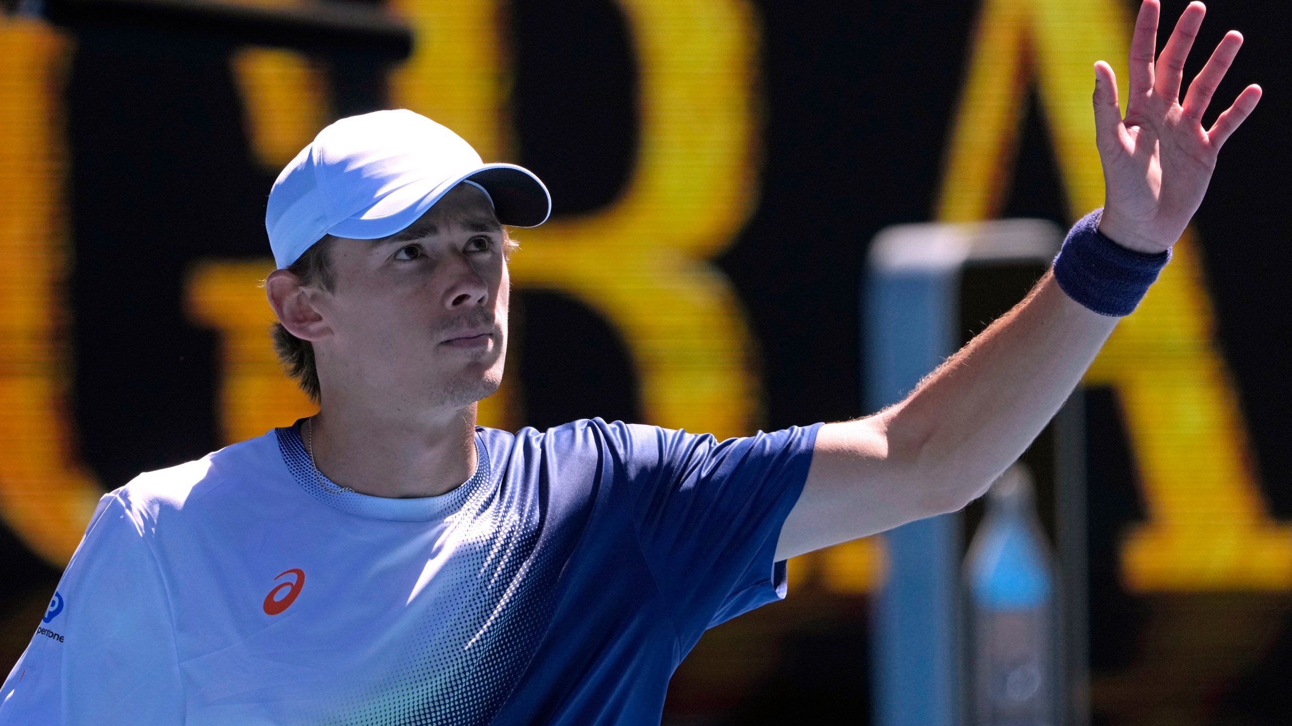 Alex de Minaur of Australia waves after defeating Tristan Boyer of the U.S. in their second round match at the Australian Open tennis championship in Melbourne, Australia, Thursday, Jan. 16, 2025. (AP Photo/Asanka Brendon Ratnayake)