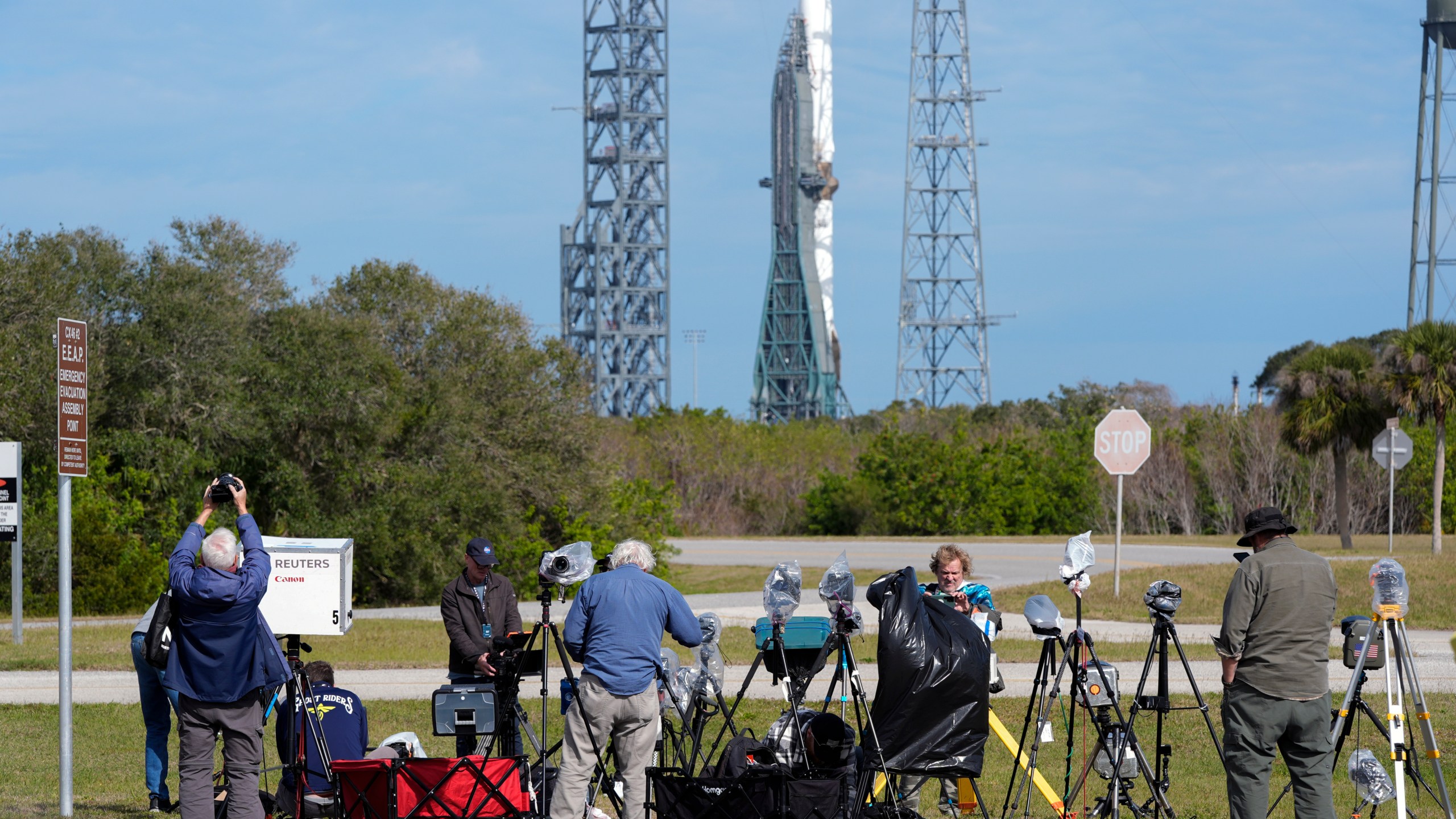 Photographers reset their remote cameras for yet another launch attempt of Blue Origin's New Glenn rocket from Launch Complex 36 at the Cape Canaveral Space Force Station, Wednesday, Jan. 15, 2025, in Cape Canaveral, Fla. (AP Photo/John Raoux)