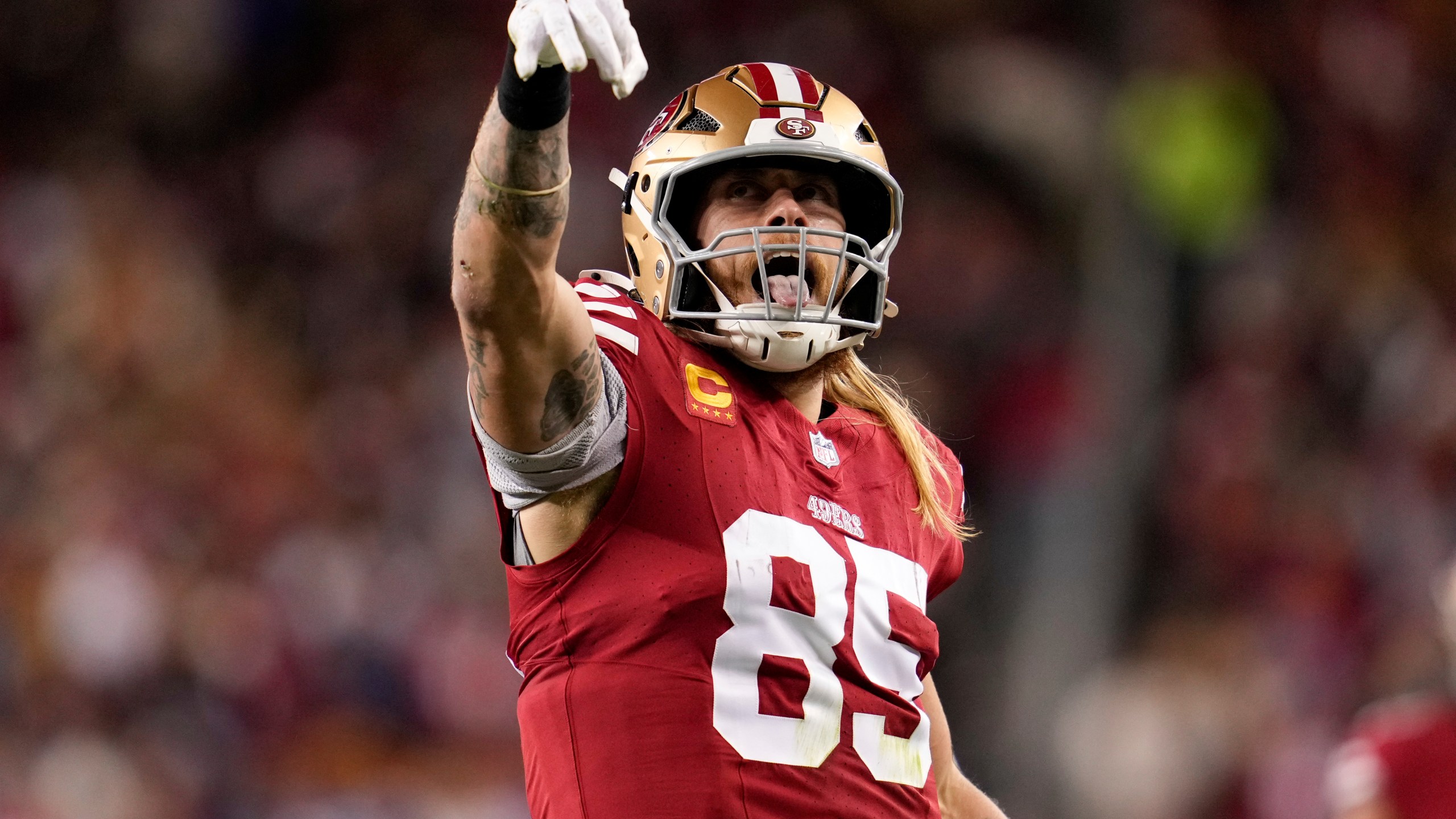 San Francisco 49ers tight end George Kittle (85) reacts after a catch during the first half of an NFL football game against the Detroit Lions, Monday, Dec. 30, 2024, in Santa Clara, Calif. (AP Photo/Godofredo A. Vásquez)