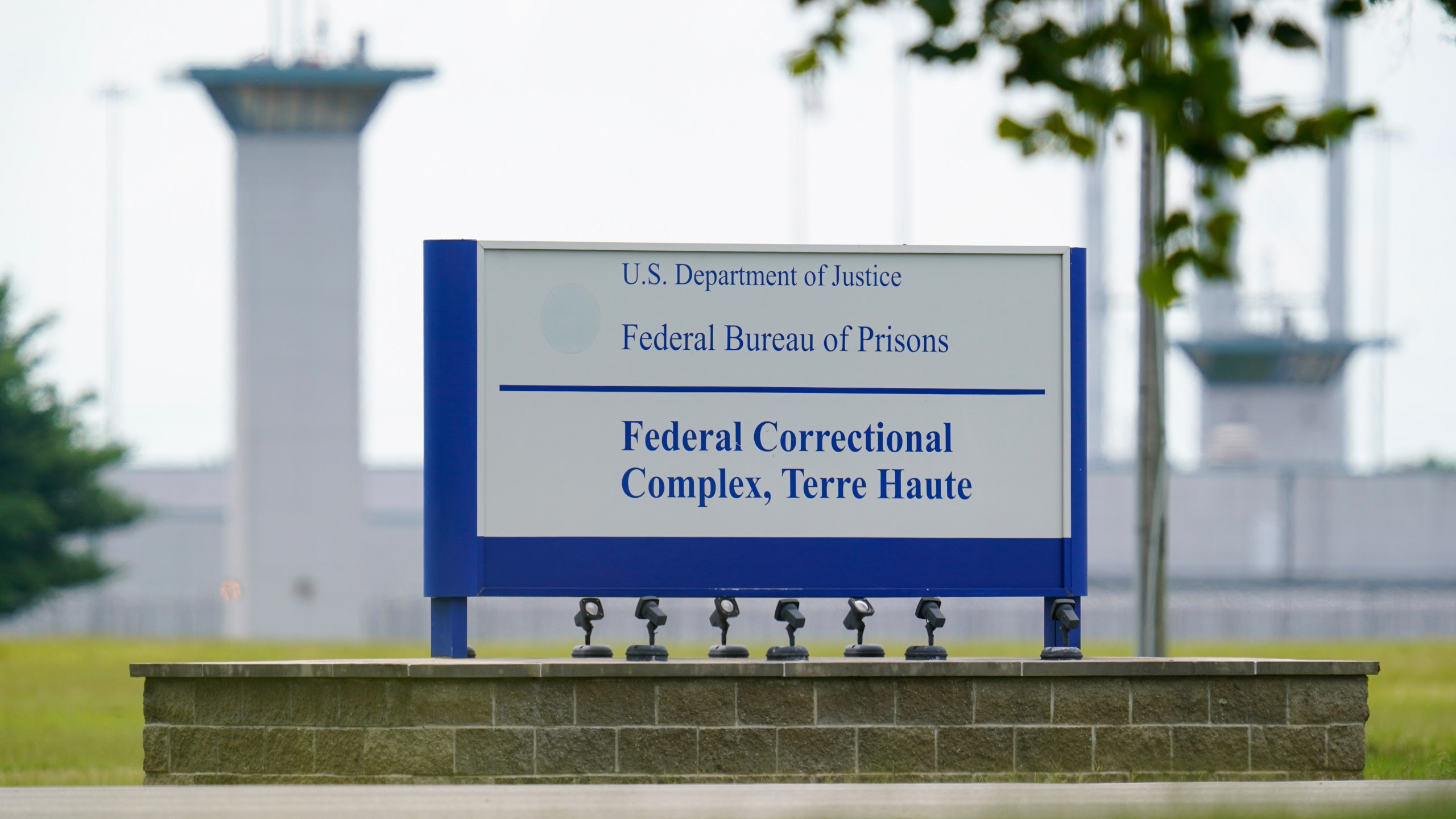 FILE - The federal prison complex in Terre Haute, Ind., is shown Friday, Aug. 28, 2020. (AP Photo/Michael Conroy, File)