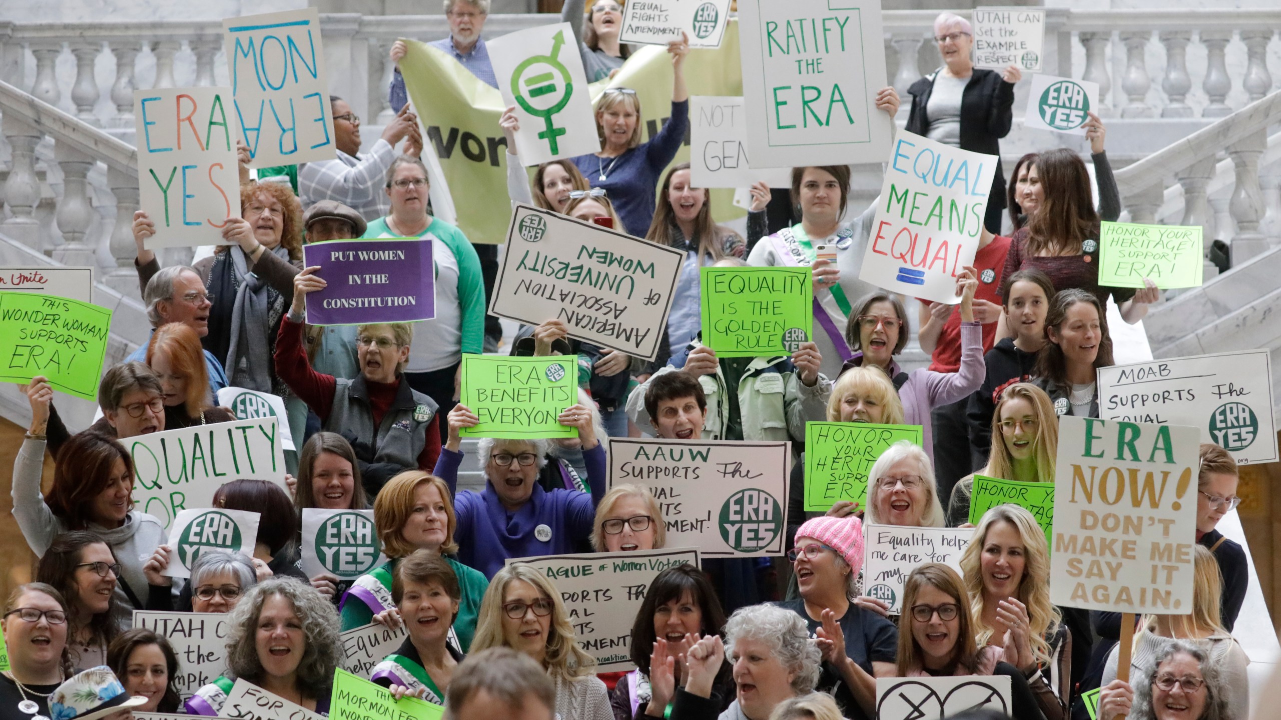 FILE - Equal Rights Amendment supporters gather during a rally at the Utah State Capitol, in Salt Lake City on Tuesday, Dec. 3, 2019. (AP Photo/Rick Bowmer, File)