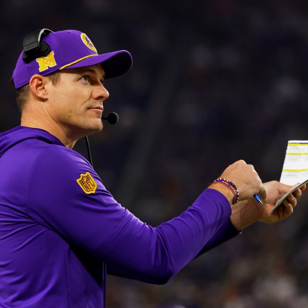 Minnesota Vikings head coach Kevin O'Connell calls a timeout during the first half of an NFL football game against the Green Bay Packers Sunday, Dec. 29, 2024, in Minneapolis. (AP Photo/Bruce Kluckhohn)