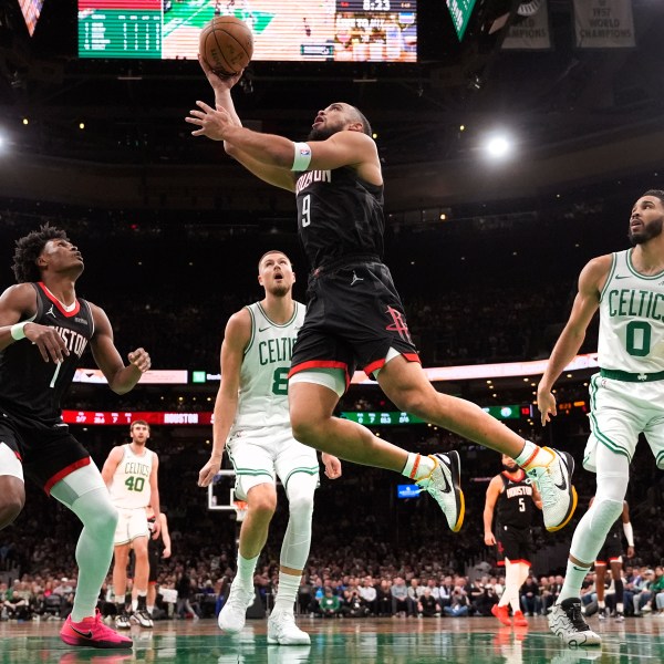 Houston Rockets forward Dillon Brooks (9) drives to the basket against the Boston Celtics during the first half of an NBA basketball game, Monday, Jan. 27, 2025, in Boston. (AP Photo/Charles Krupa)