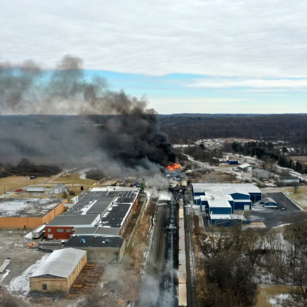 FILE - This photo taken with a drone shows portions of a Norfolk Southern freight train that derailed in East Palestine, Ohio, Feb. 4, 2023. (AP Photo/Gene J. Puskar, File)