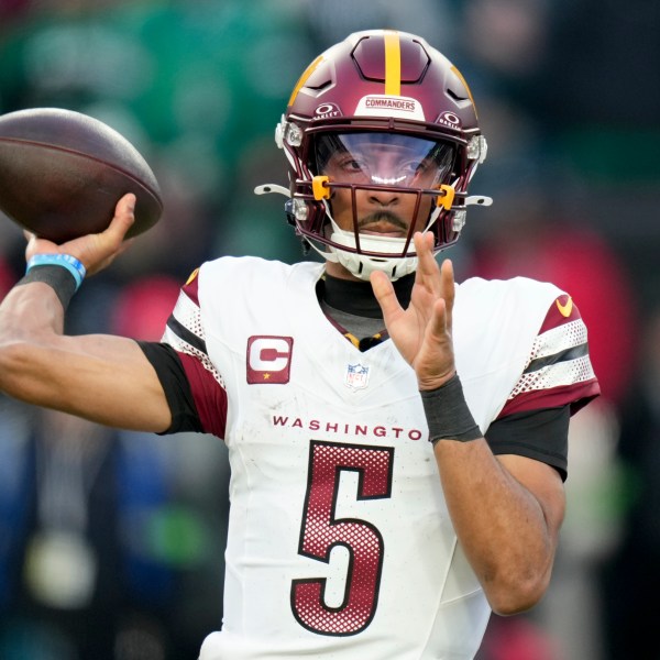 Washington Commanders quarterback Jayden Daniels passes against the Philadelphia Eagles during the first half of the NFC Championship NFL football game, Sunday, Jan. 26, 2025, in Philadelphia. (AP Photo/Seth Wenig)