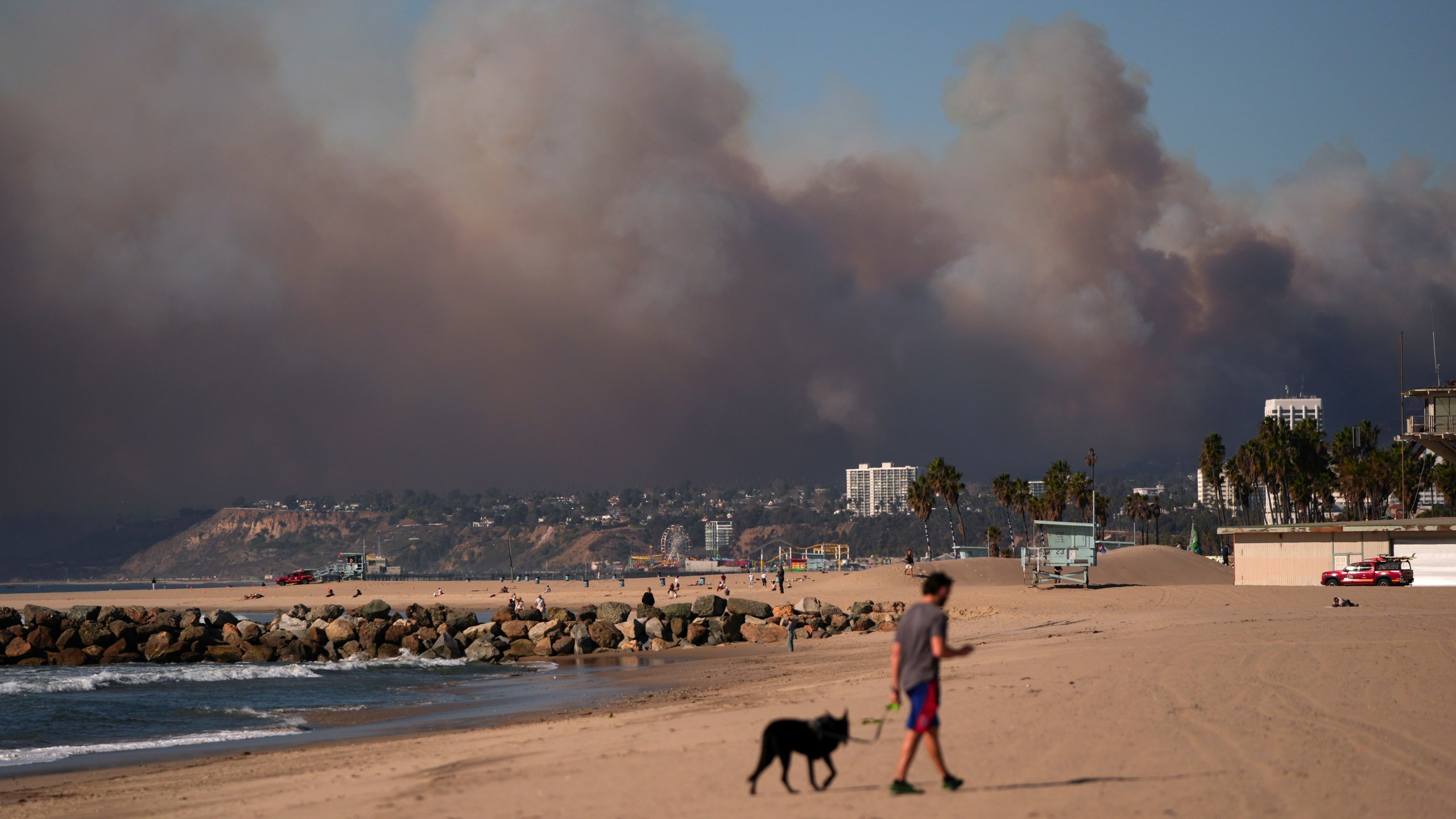 FILE - Smoke from a wildfire is seen from the Venice Beach section of Los Angeles, Jan. 7, 2025. (AP Photo/Jae C. Hong, File)