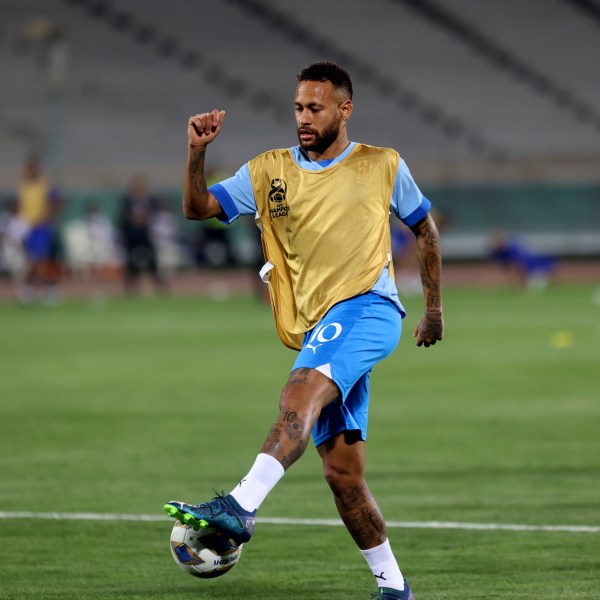 FILE - Al Hilal's Neymar shoots the ball during warm up for the AFC Champions League soccer match against Iran's Nassaji at the Azadi Stadium in Tehran, Iran, Oct. 3, 2023. (AP Photo, File)