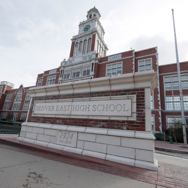 FILE — This April 17, 2019 file photo shows Denver East High School in Denver. (AP Photo/David Zalubowski, File)