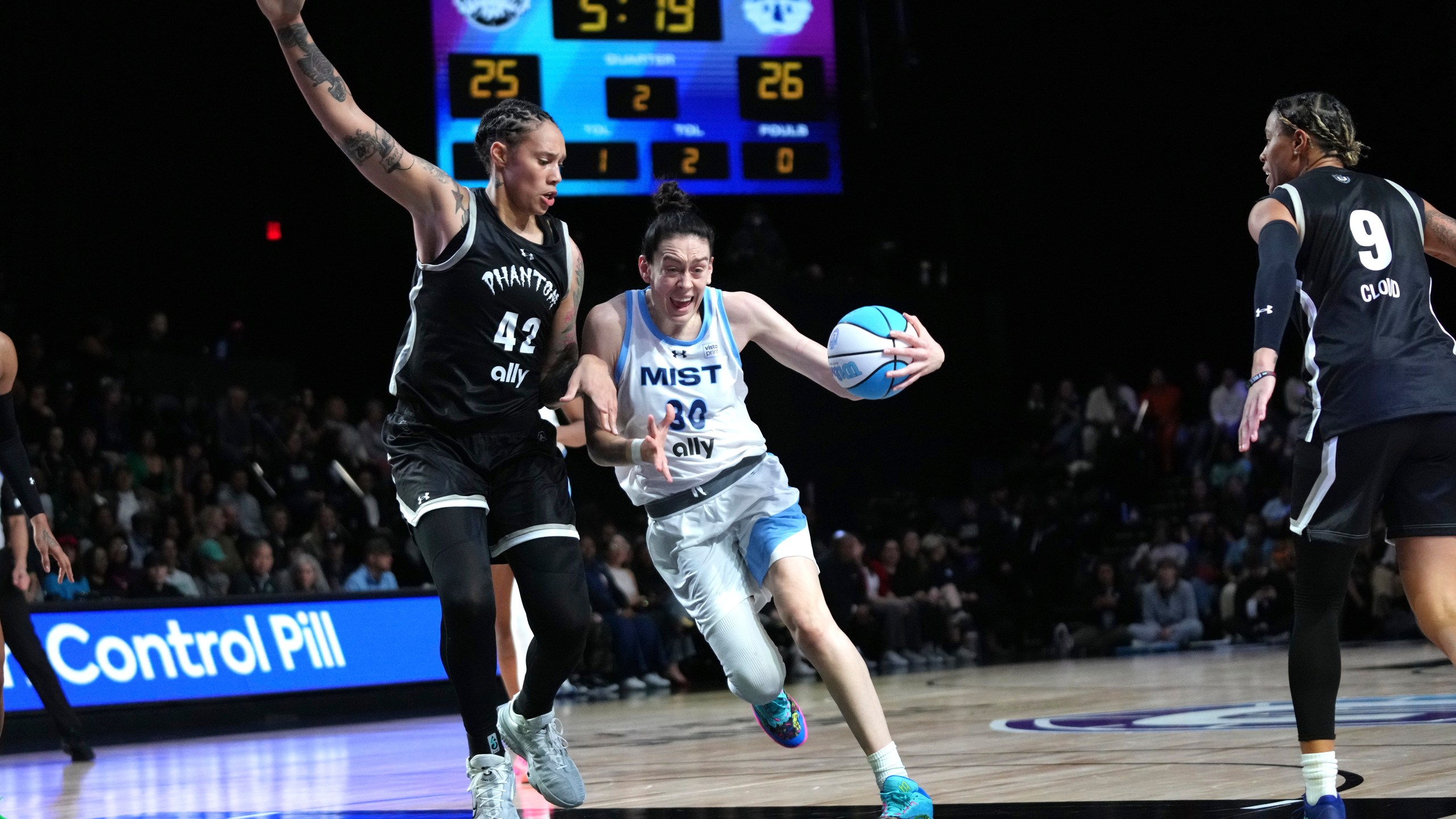 Phantom center Brittney Griner (42) defends against Mist forward Breanna Stewart (30) during the first half of an Unrivaled 3-on-3 basketball game Friday, Jan. 24, 2025, in Medley, Fla. (AP Photo/Lynne Sladky)