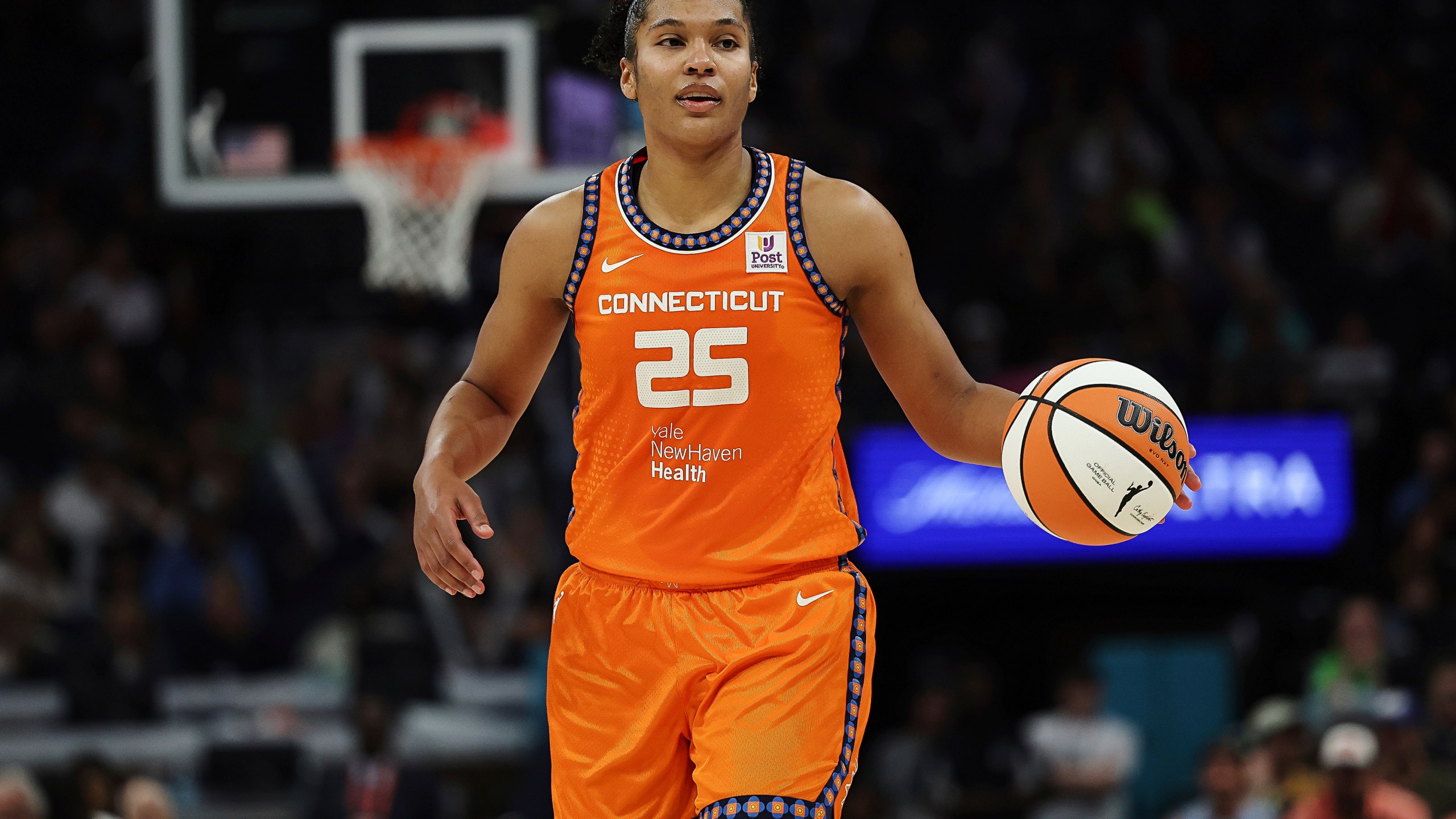 FILE - Connecticut Sun forward Alyssa Thomas (25) handles the ball during the second half of Game 1 of a WNBA basketball semifinals series against the Minnesota Lynx, Sept. 29, 2024, in Minneapolis. (AP Photo/Stacy Bengs, File)