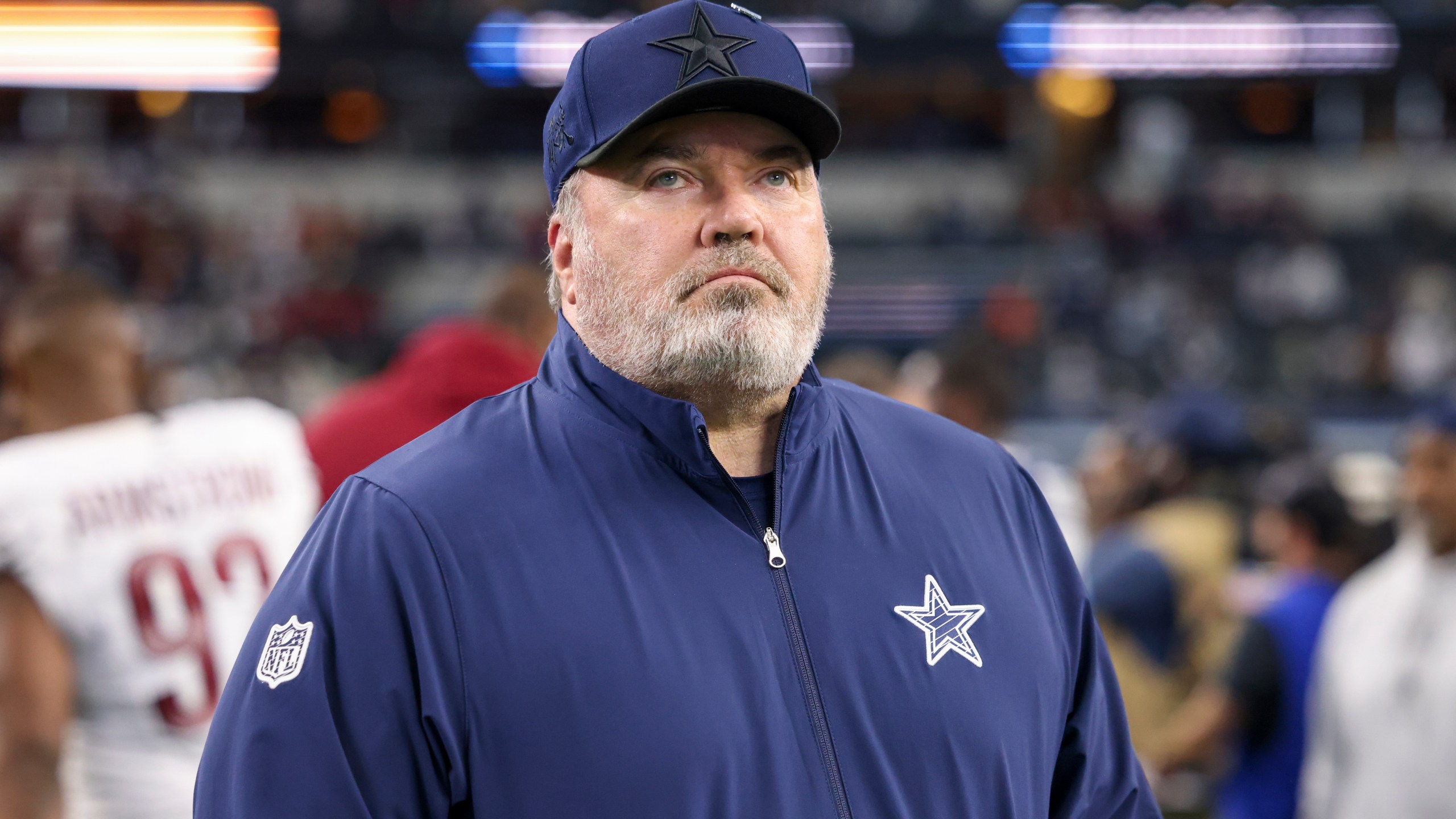 Dallas Cowboys head coach Mike McCarthy walks on the field following an NFL football game against the Washington Commanders, Sunday, Jan. 5, 2025, in Arlington, Texas. The Commanders won 23-19. (AP Photo/Gareth Patterson)