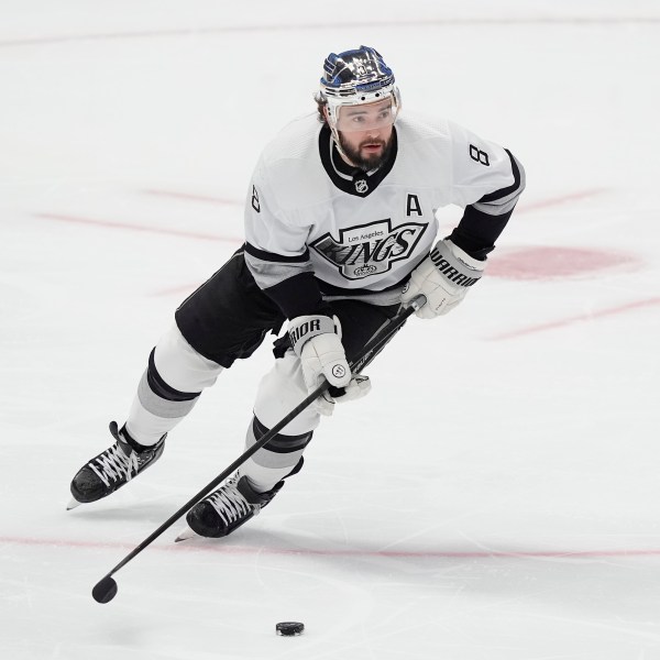 FILE - Los Angeles Kings defenseman Drew Doughty (8) skates with the puck during the first period an NHL hockey game against the Dallas Stars in Dallas, March 16, 2024. (AP Photo/LM Otero, File)