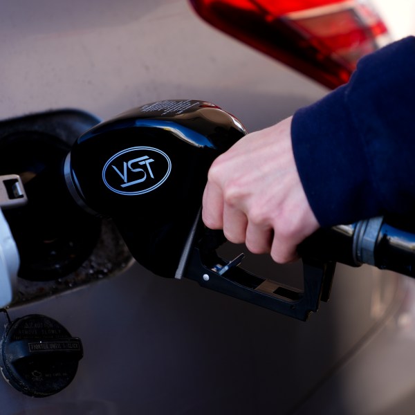 FILE - A driver fills up at a gasoline pump at a Shell gas station, Oct. 9, 2024, in Seattle. (AP Photo/Lindsey Wasson, File)