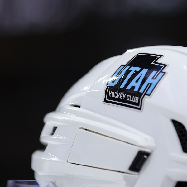 FILE - The Utah Hockey Club logo is seen on the helmet of center Nick Schmaltz (8) during the third period of an NHL hockey game against the Minnesota Wild, Dec. 20, 2024, in St. Paul, Minn. (AP Photo/Matt Krohn, file)