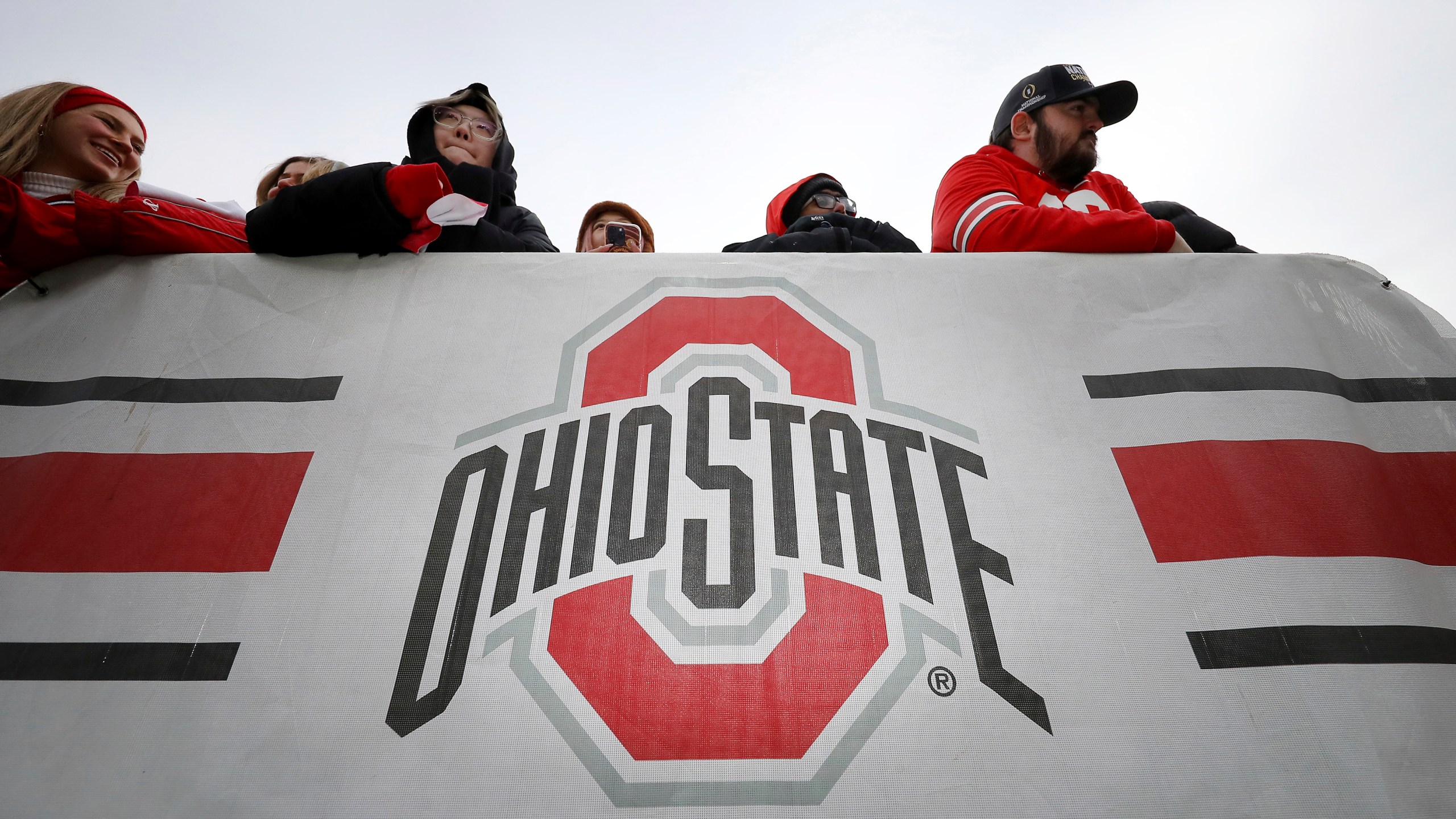 Ohio State Buckeyes fans enter the field before the National Championship celebration at Ohio Stadium in Columbus, Ohio, Sunday, Jan. 26, 2025. (AP Photo/Joe Maiorana)