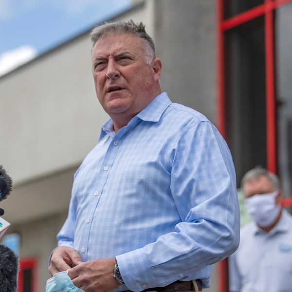 FILE - Georgia Insurance and Safety Fire Commissioner John King makes a statement and answers questions from the media following a tour of Fieldale Farms while visiting Gainesville, Ga., May 15, 2020. (Alyssa Pointer/Atlanta Journal-Constitution via AP, FILE)