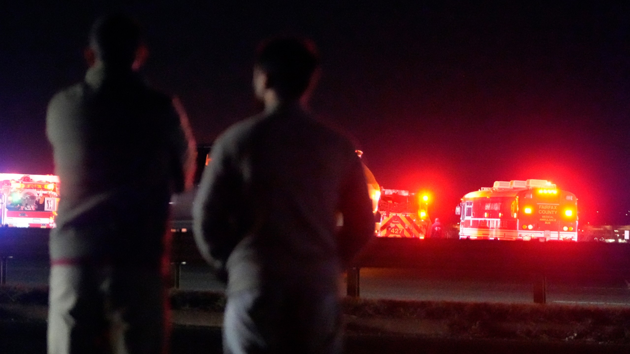 Emergency equipment stages at Gravelly Point, north of Ronald Reagan Washington National Airport, along the Potomac River, Wednesday, Jan. 29, 2025, in Arlington, Va. (AP Photo/Mark Schiefelbein)