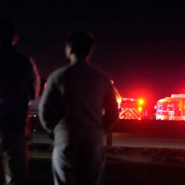 Emergency equipment stages at Gravelly Point, north of Ronald Reagan Washington National Airport, along the Potomac River, Wednesday, Jan. 29, 2025, in Arlington, Va. (AP Photo/Mark Schiefelbein)