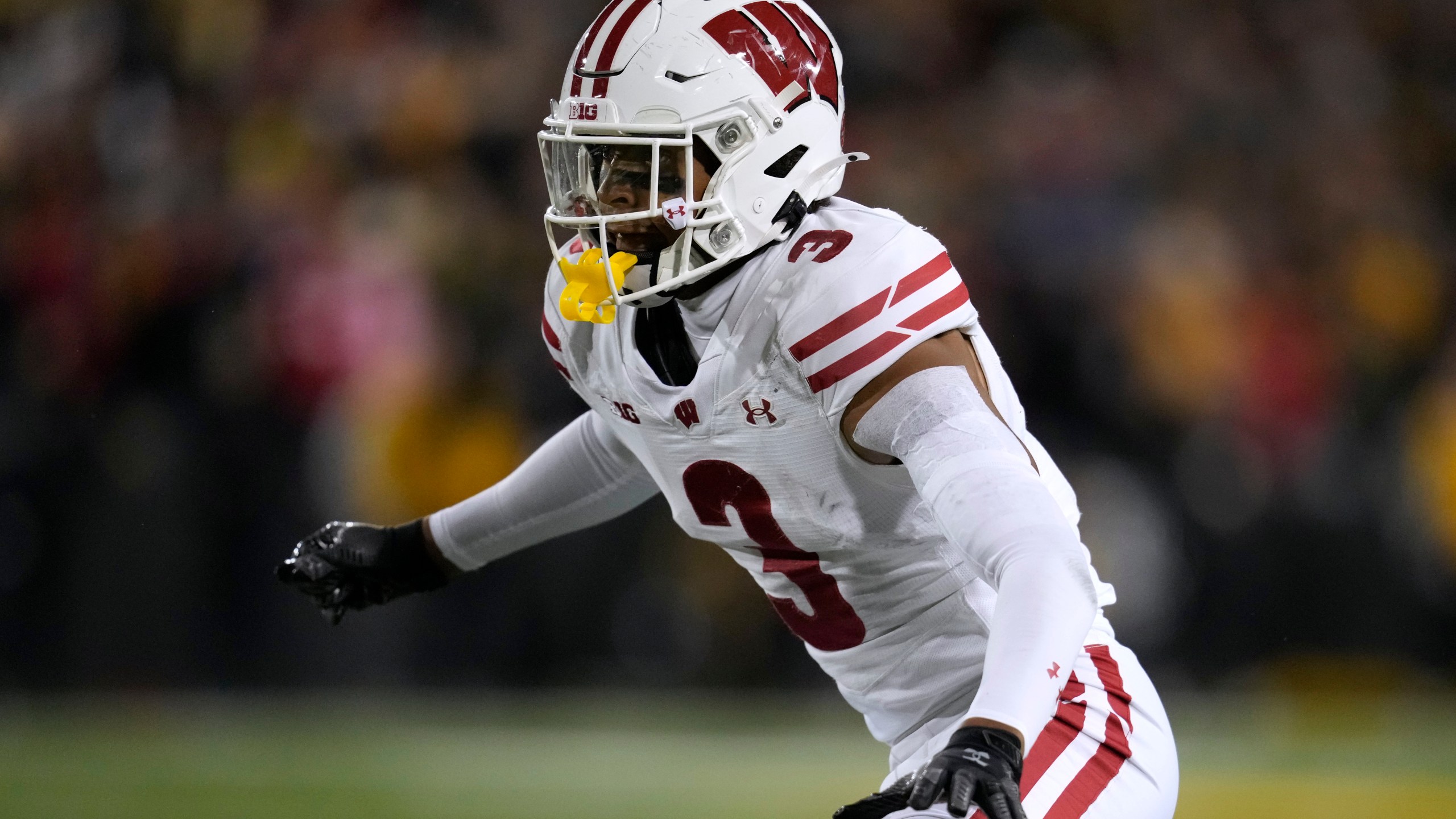 FILE - Wisconsin cornerback Nyzier Fourqurean (3) gets set for a play during the second half of an NCAA college football game against Iowa, Saturday, Nov. 2, 2024, in Iowa City, Iowa. (AP Photo/Charlie Neibergall, File)