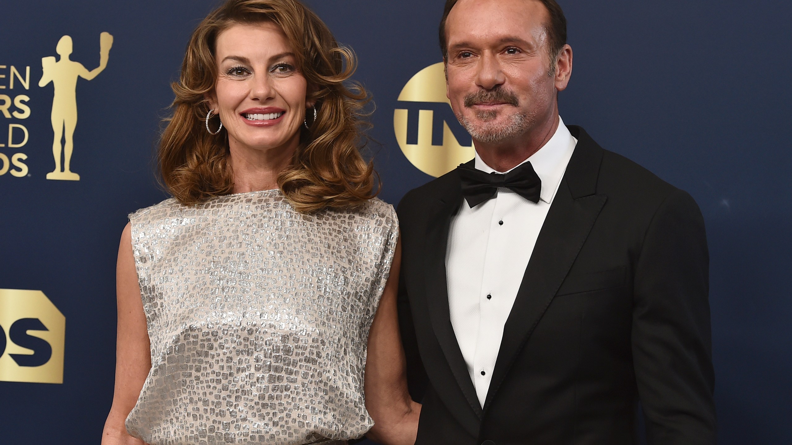 FILE0 Faith Hill, left, and Tim McGraw arrive at the 28th annual Screen Actors Guild Awards at the Barker Hangar on Sunday, Feb. 27, 2022, in Santa Monica, Calif. (Photo by Jordan Strauss/Invision/AP, File)