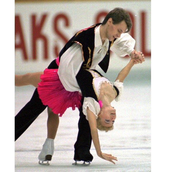 FILE - Evgenia Shishkova and Vadim Naumov of Russia perform during free skating in the pairs event of the NHK Trophy International Figure Skating Competition at Nagoya central Japan, Dec. 9, 1995. (AP Photo/Shizuo Kambayashi, File)