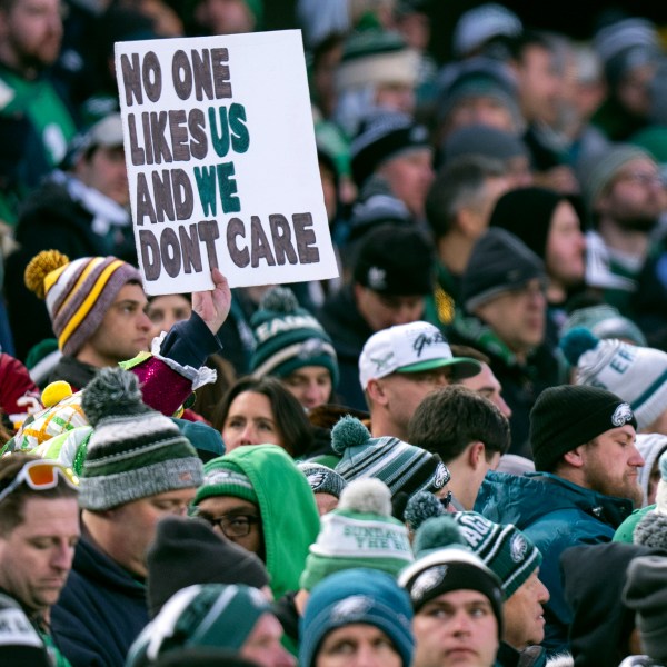 FILE - Philadelphia Eagles fans hold up a sign during the NFC Championship NFL football game against the Washington Commanders, Sunday, Jan. 26, 2025, in Philadelphia. (AP Photo/Chris Szagola, File)