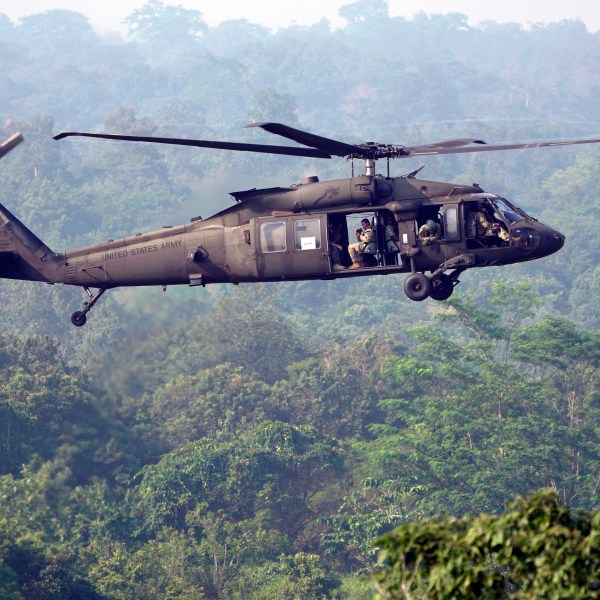 FILE - A U.S. Army Black Hawk helicopter flies during Super Garuda Shield 2022 joint military exercises in Baturaja, South Sumatra, Indonesia, Aug. 12, 2022. (AP Photo/Dita Alangkara, File)