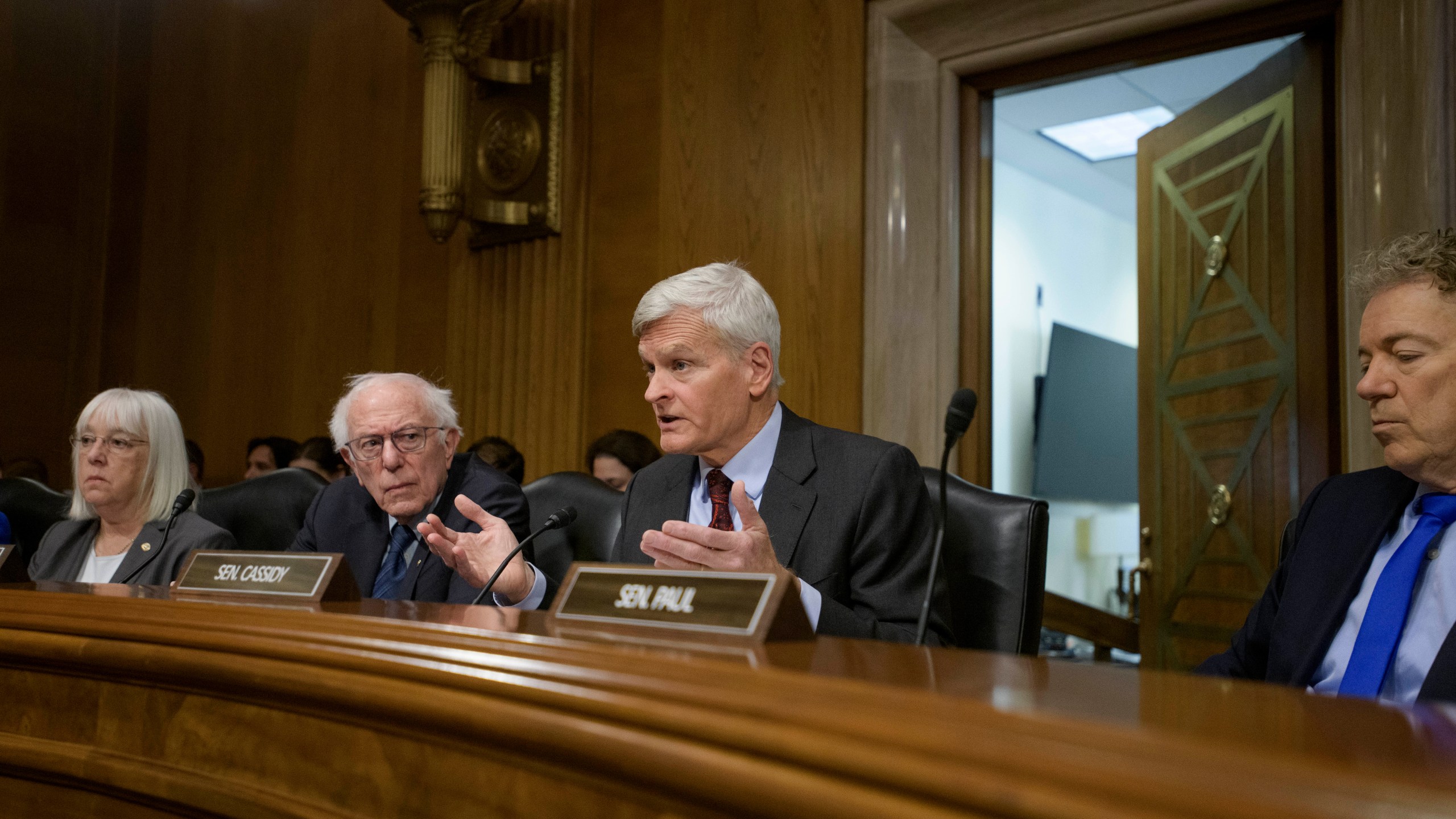 Committee Chairman Sen. Bill Cassidy, R-La., second from right, is joined by Sen. Patty Murray, D-Wash., from left, Committee Ranking Member Sen. Bernie Sanders, I-Vt., and Sen. Rand Paul, R-Ky., as he delivers his opening statement to Robert F. Kennedy, Jr., President Trump's nominee to serve as Secretary of Health and Human Services, during a Senate Committee on Health, Education, Labor and Pensions hearing for his pending confirmation on Capitol Hill, Thursday, Jan. 30, 2025, in Washington. (AP Photo/Rod Lamkey, Jr.)