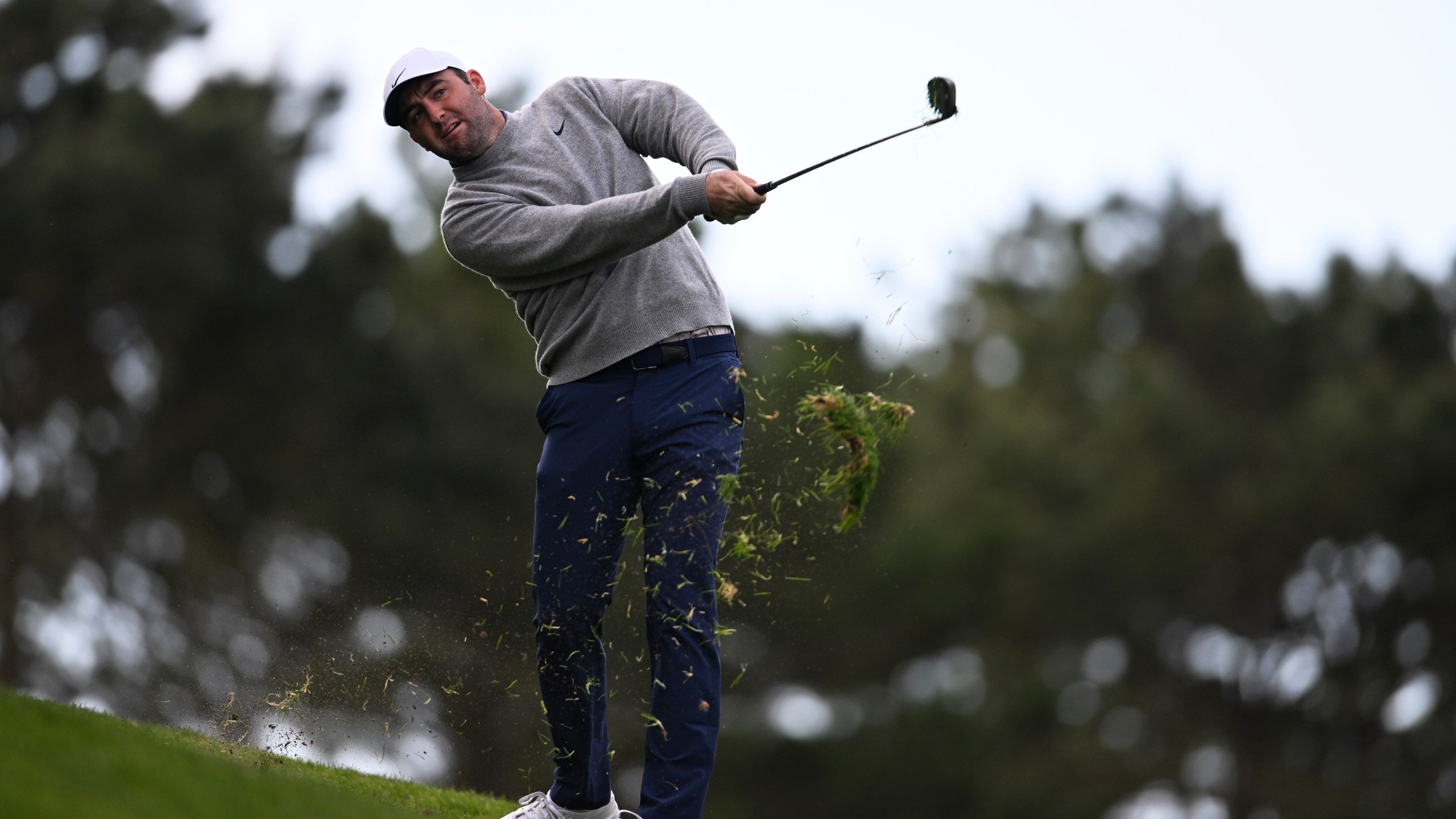 Scottie Scheffler hits from the 10th fairway at Spyglass Hill Golf Course during the first round of the AT&T Pebble Beach Pro-Am golf tournament, Thursday, Jan. 30, 2025, in Pebble Beach, Calif. (AP Photo/Nic Coury)