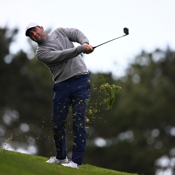 Scottie Scheffler hits from the 10th fairway at Spyglass Hill Golf Course during the first round of the AT&T Pebble Beach Pro-Am golf tournament, Thursday, Jan. 30, 2025, in Pebble Beach, Calif. (AP Photo/Nic Coury)