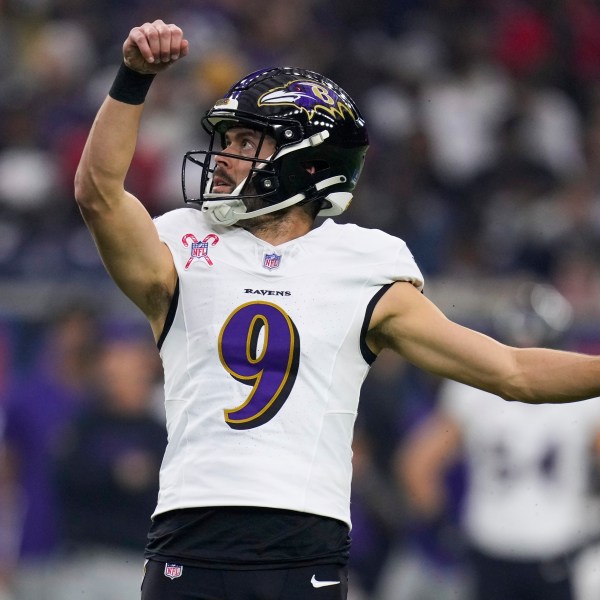 FILE - Baltimore Ravens place kicker Justin Tucker (9) watches his extra point against the Houston Texans during the first half of an NFL football game Wednesday, Dec. 25, 2024, in Houston. (AP Photo/Eric Christian Smith, File)