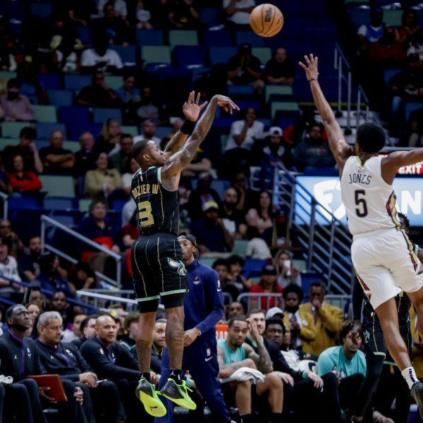 FILE - Charlotte Hornets guard Terry Rozier (3) shoots over New Orleans Pelicans forward Herbert Jones (5) during the first quarter of an NBA basketball game in New Orleans, Thursday, March 23, 2023. (AP Photo/Derick Hingle, File)